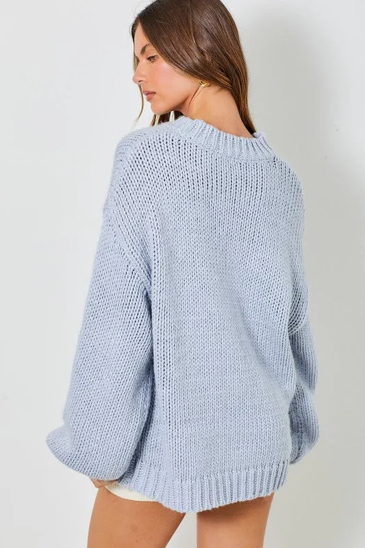 COWBOY BOOTS WITH RIBBON KNIT SWEATER